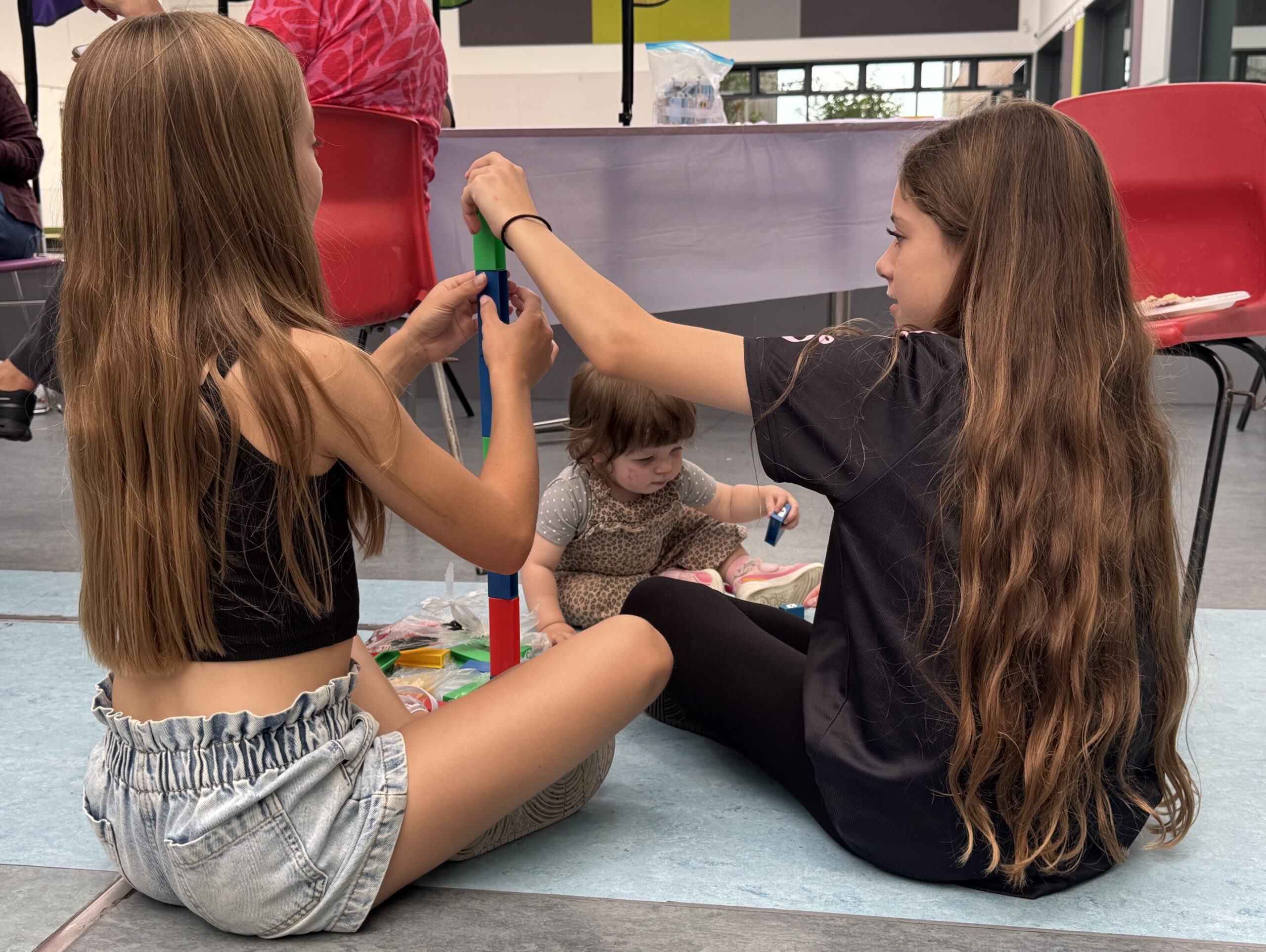 Children playing in the BSL kiddies corner at the charity event for Deaf children