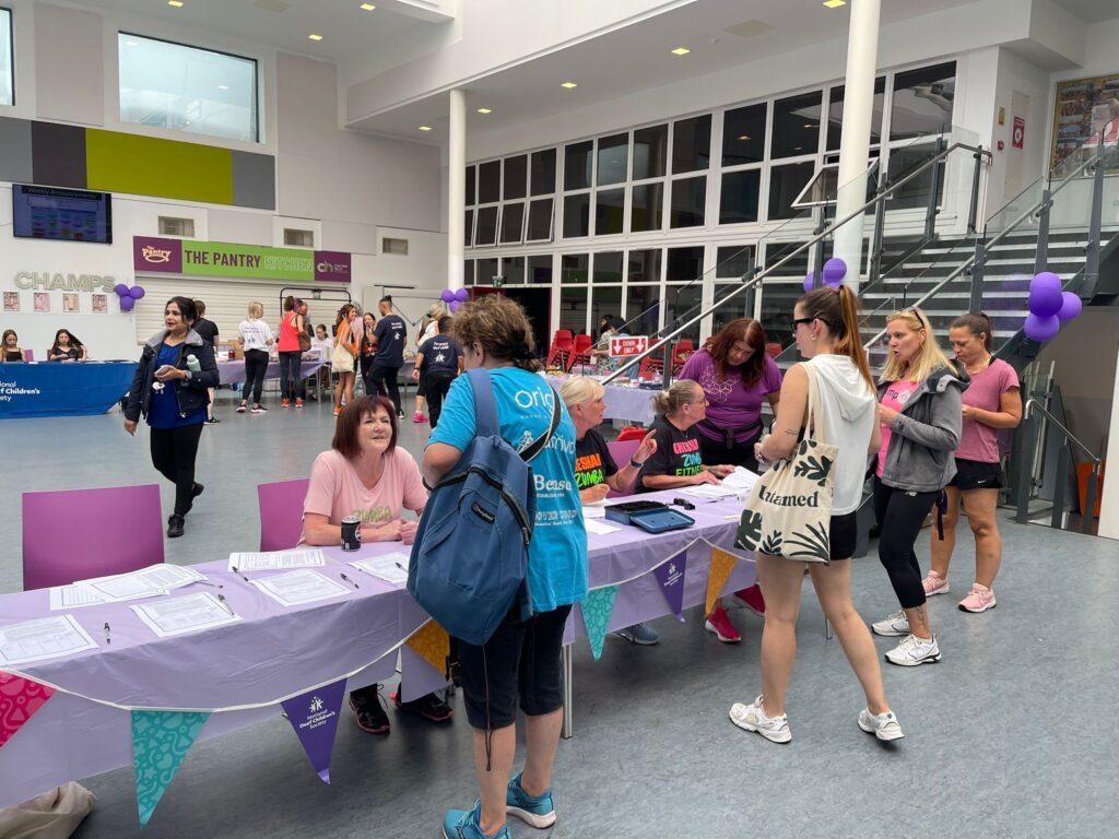 Participants entering our charity Zumbathon for Deaf children