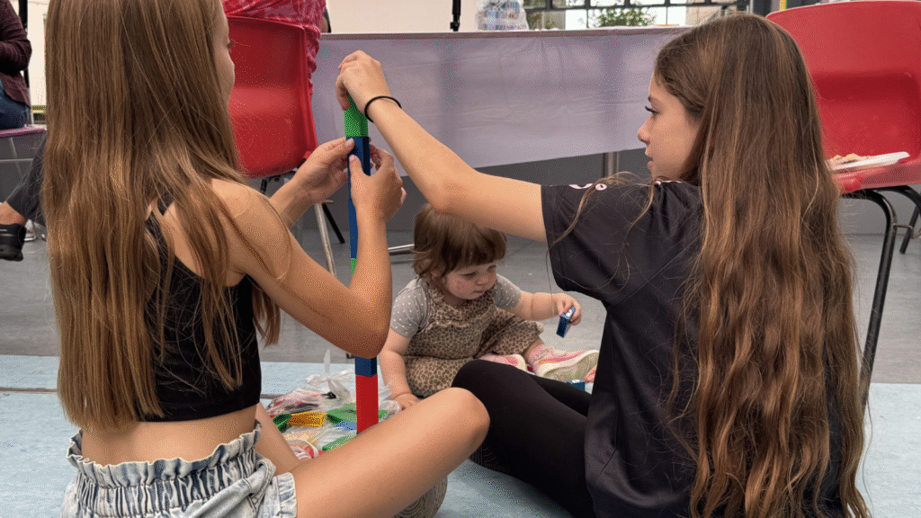Children playing in the BSL kiddies corner at the charity event for Deaf children