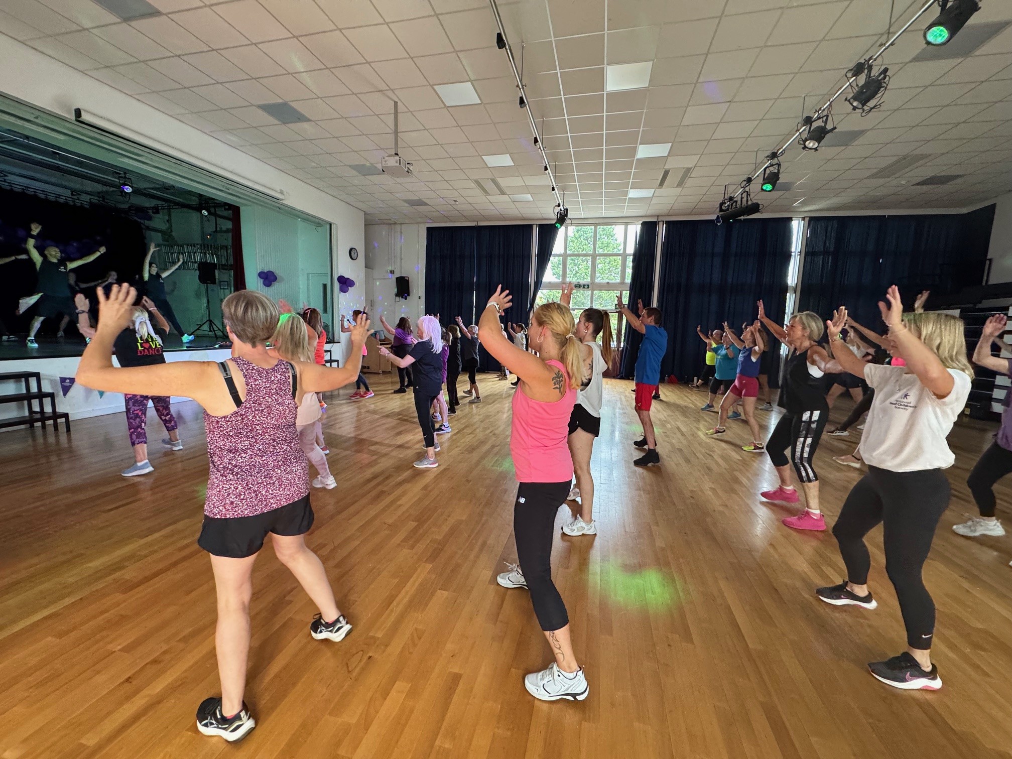 Dancing at our inclusive charity Zumbathon for Deaf children