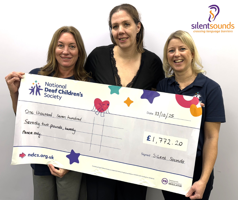 Silent Sounds team chque presentation for the NDCS fundraiser Zumbathon.